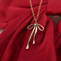 BOW NECKLACE - GOLD