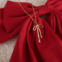 BOW NECKLACE - GOLD